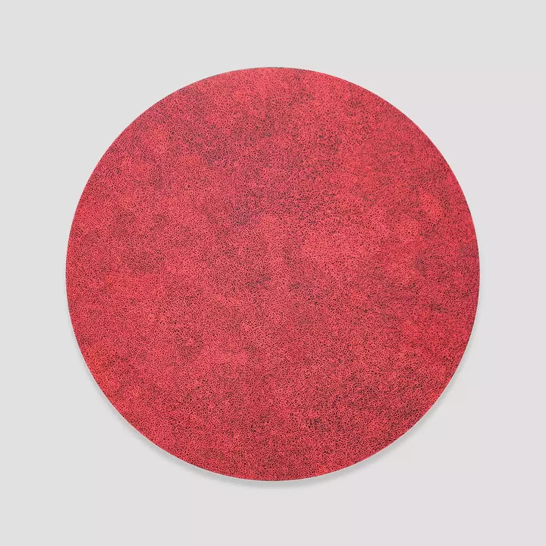 Extra fine red scribble filling a black circle