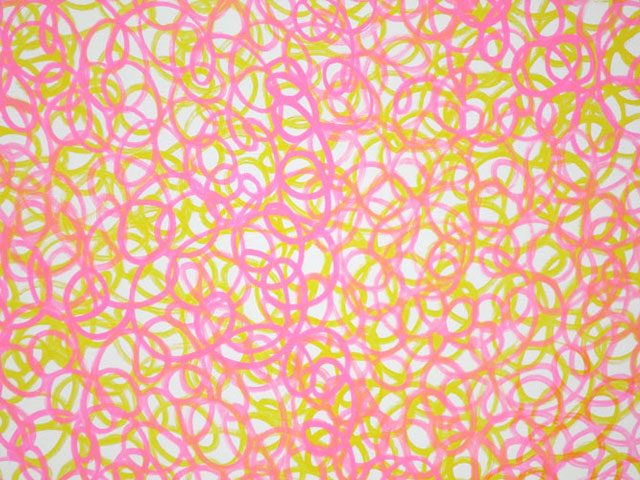 Medium pink and yellow scribbles filling a white circle